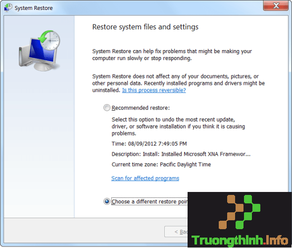 chọn Choose a different restore point 